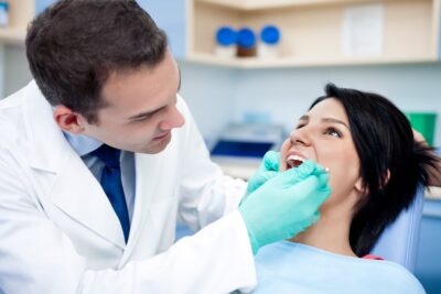 a dental hygienist and a dentist